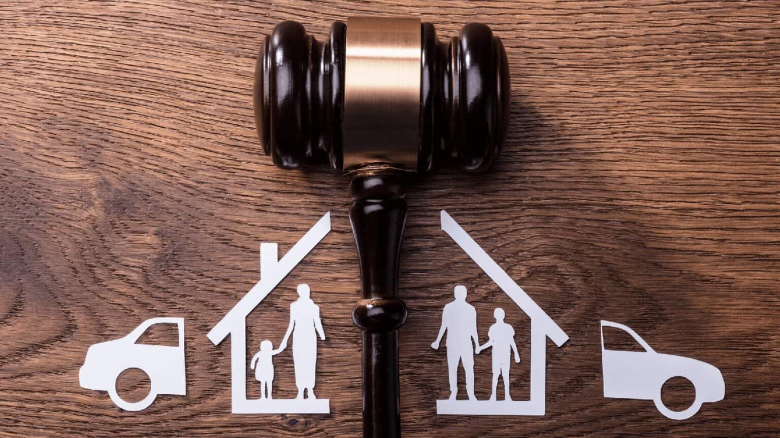 Gavel and paper family cutouts representing child custody and divorce in Florida